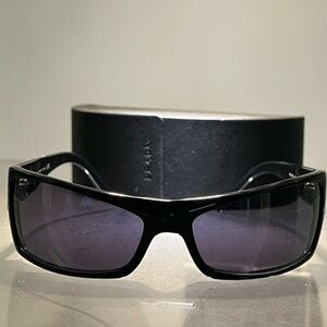Prada sunglasses model# SPR 08G 63016 1AB-1A1 125